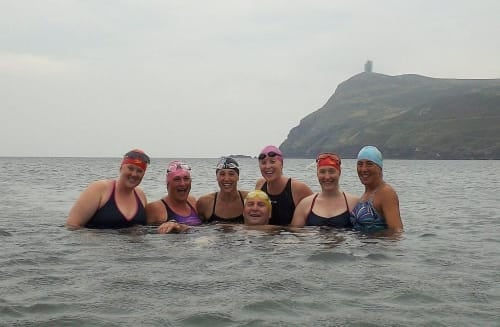 Relay channel swim team in the sea