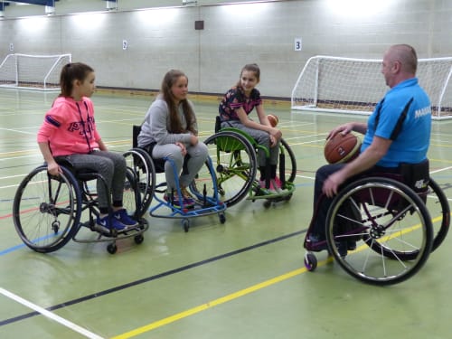 Joe Gilbert teaching wheelchair skills