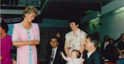 Princess of Wales talking to a family