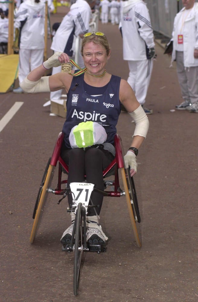 Paula at the end of the Marathon with her medal