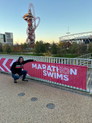 Danny by the Marathon Swims sign in London