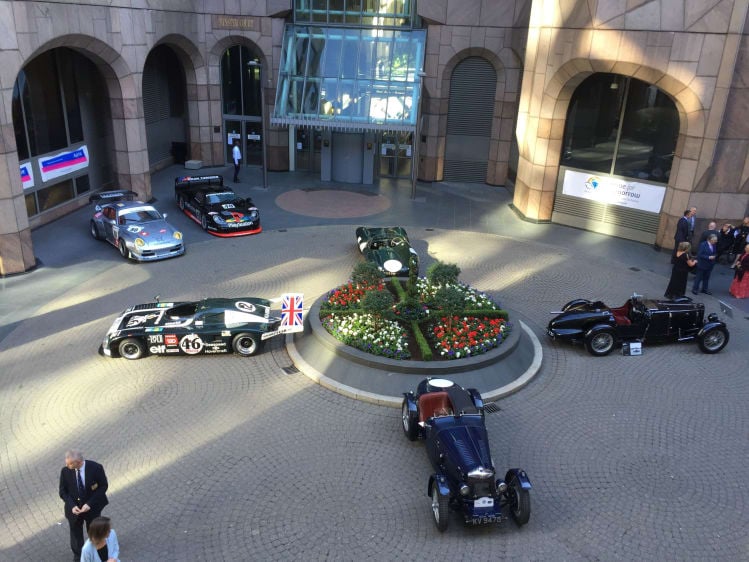 Le Mans cars in the courtyard