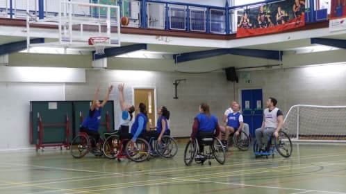 Clyde & Co playing wheelchair basketball