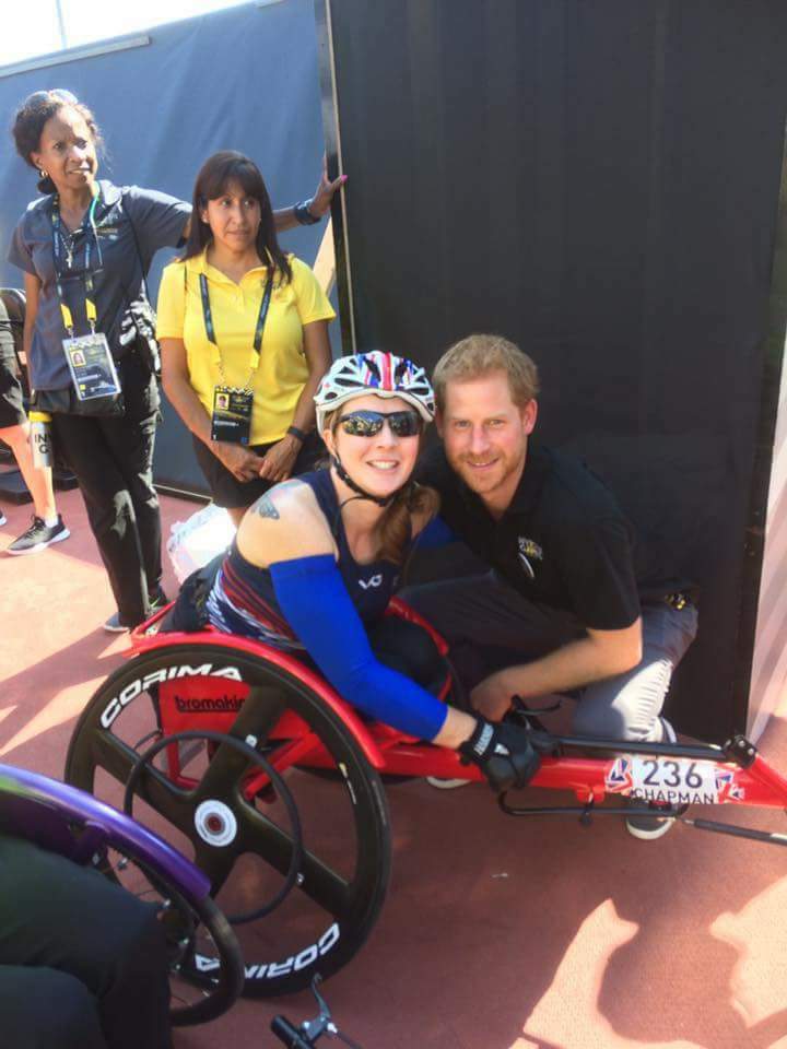 Lindsay in her racing wheelchair with Prince Harry