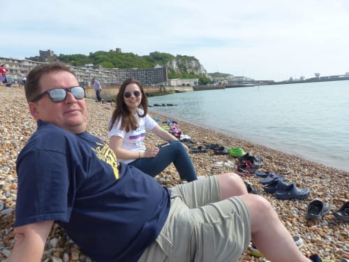 Colin sitting on Dover Beach in 2017