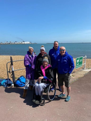 Paula in her wheelchair with the Mutts in Dover