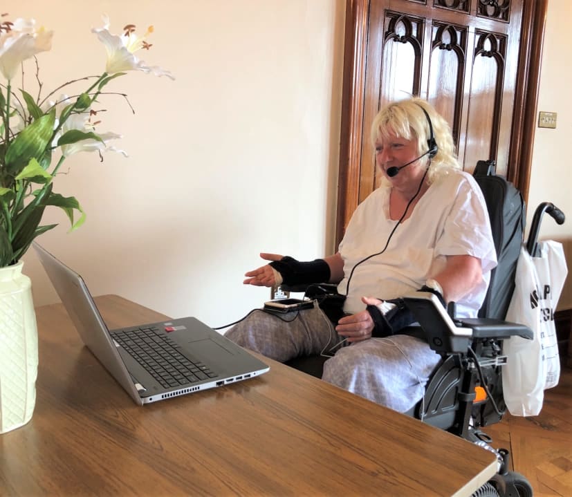 Paula using assistive technology