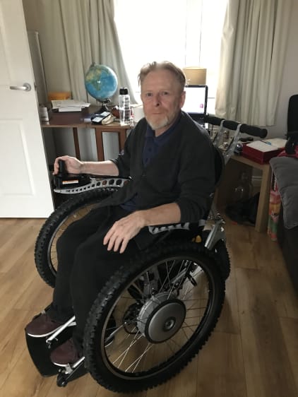 John in his wheelchair in an Aspire accessible house