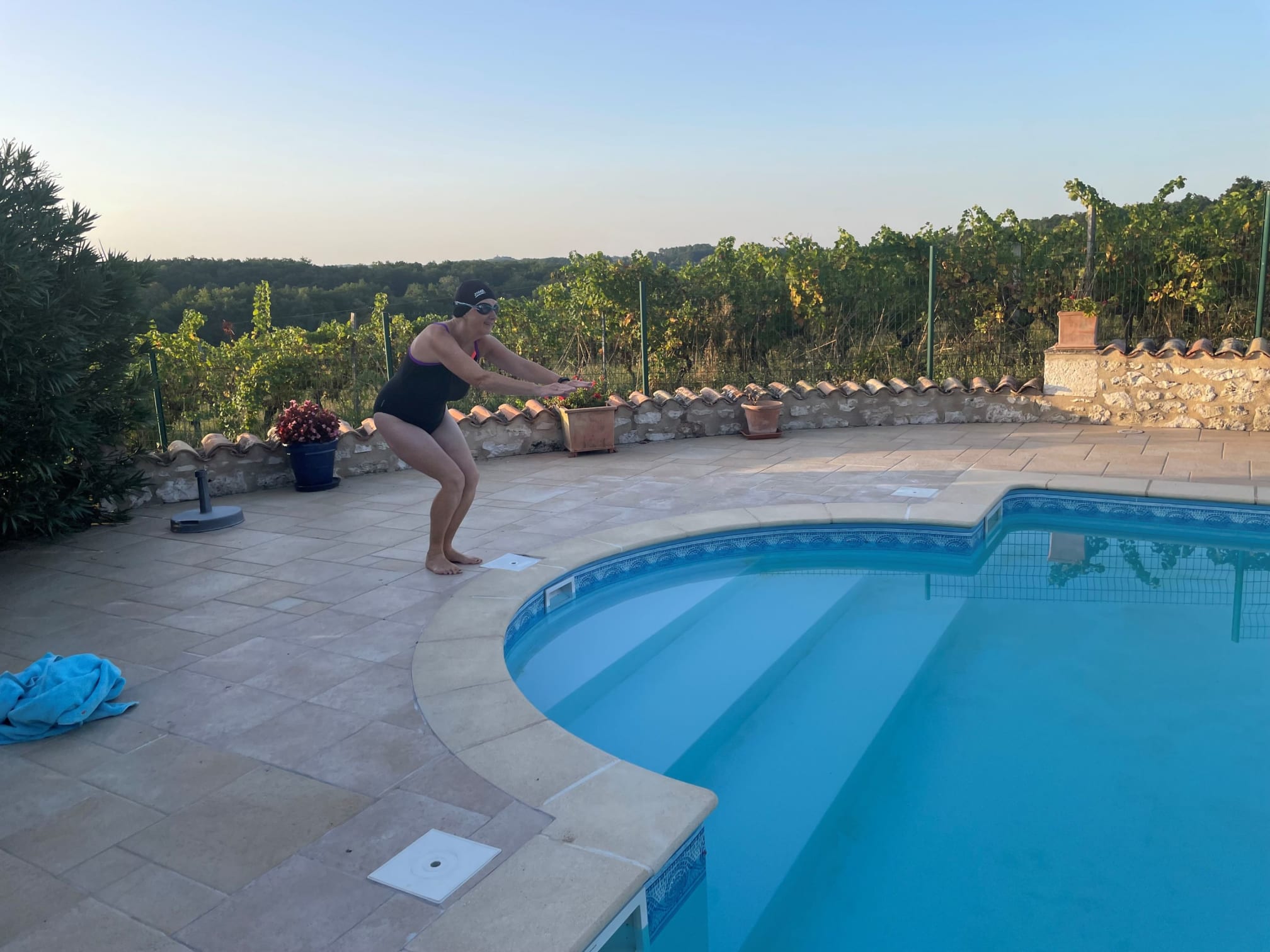 Moira pretending to dive into the swimming pool
